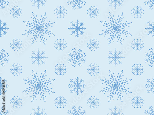 Seamless pattern with white snowflakes on a blue background