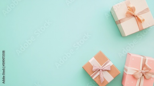 Gift boxes on a flat lay with a colored background