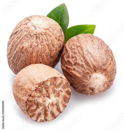 Slika na platnu Nutmeg seeds isolated on white background.