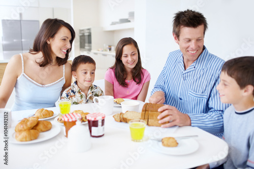 Family, conversation and morning breakfast in home, dining table and support with healthy food. Parents, children and talking together in kitchen with meal, love and brunch nutrition for bonding