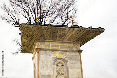 Facade of baroque style mihrisah sultan fountain in the garden of littlewater pavilion in istanbul photo