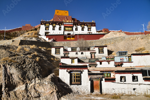 Buildings of Pelkor Monastery Carved Into the Rock in Gyantse, Tibet photo