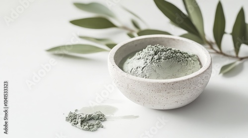 An exfoliating scrub infused with green clay and natural ingredients accompanied by a beauty mask showcased on a pristine white background encouraging self care indulgence photo