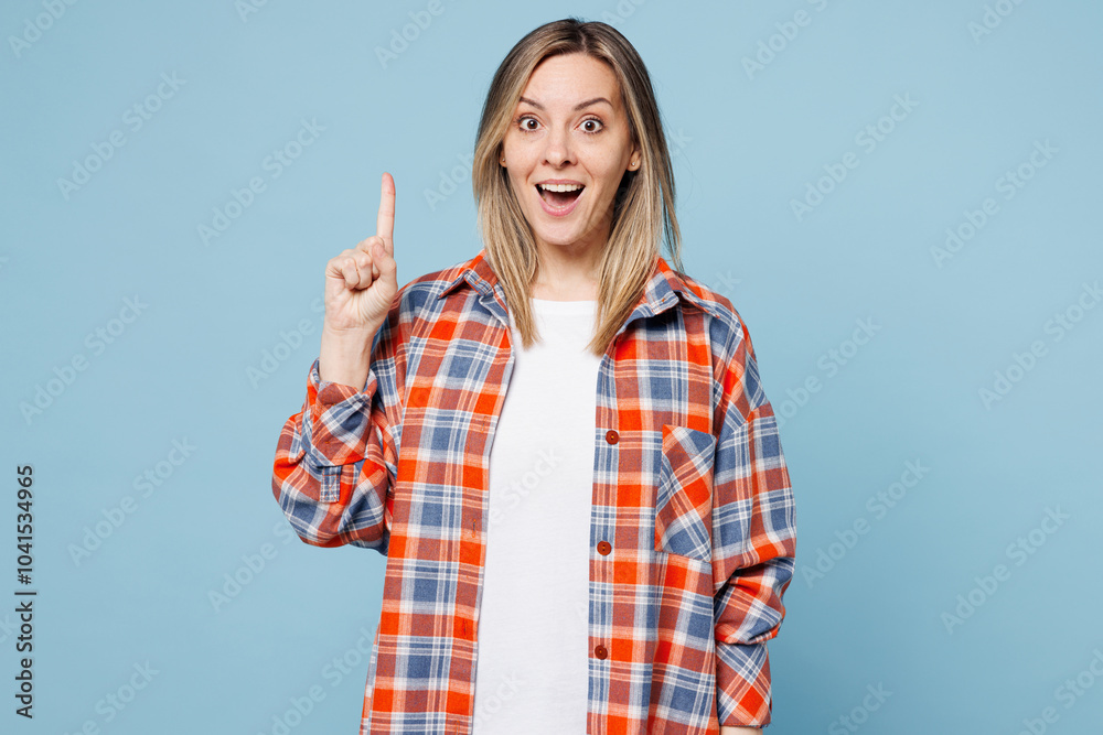 Young smart proactive woman she wear red shirt t-shirt casual clothes holding index finger up with great new idea isolated on plain pastel light blue cyan background studio portrait Lifestyle concept Young smart proactive woman she wear red shirt t-shirt casual clothes holding index finger up with great new idea isolated on plain pastel light blue cyan background studio portrait Lifestyle concept