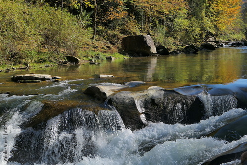 The mountain river Prut and waterfalls Probiy in Yaremche, Carpathians, Ukraine photo