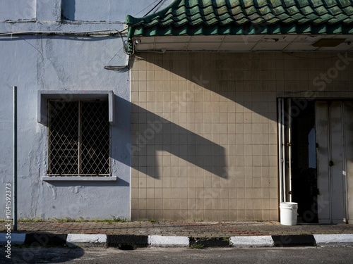 Morning shadows over old buildings photo