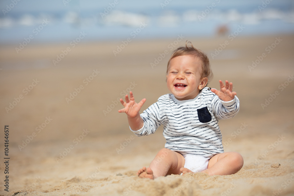 little boy lies on a sea sandy beach little boy lies on a sea sandy beach