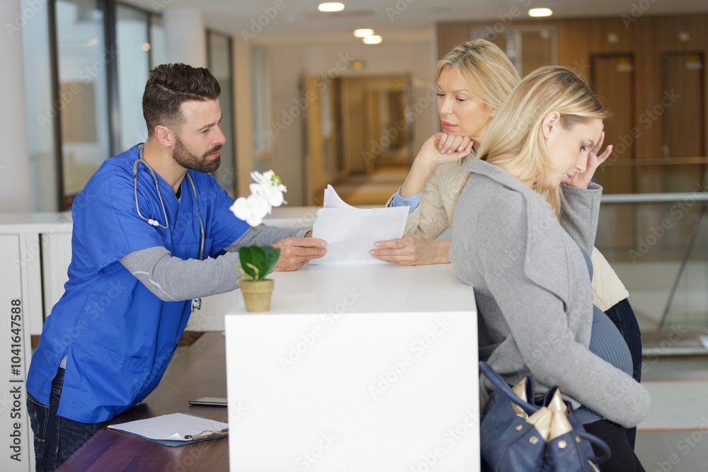 Fototapeta premium young pregnant woman at a doctors reception