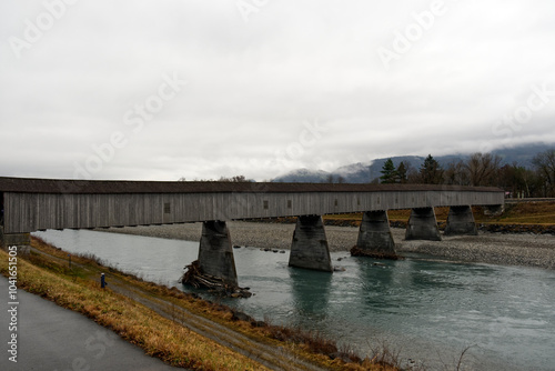 Old bridge along Rhine River between Vaduz and Sevelen photo