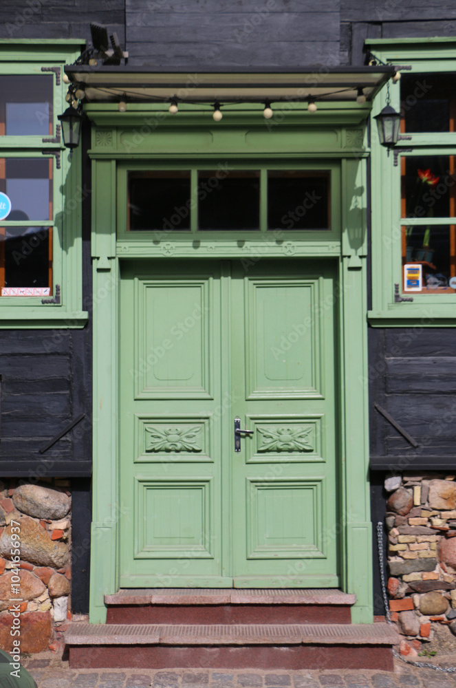 Naklejka premium Historicism style architectural facade details, door, Europe, Latvia