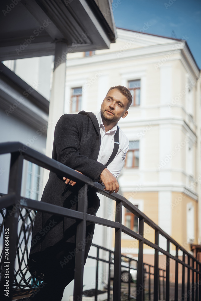 young guy with a beard and mustache with glasses in a suit posing on the street in the sunlight, fashion man, style, vintage style, retro men, handsome beard, outdoor portrait, close up young guy with a beard and mustache with glasses in a suit posing on the street in the sunlight, fashion man, style, vintage style, retro men, handsome beard, outdoor portrait, close up