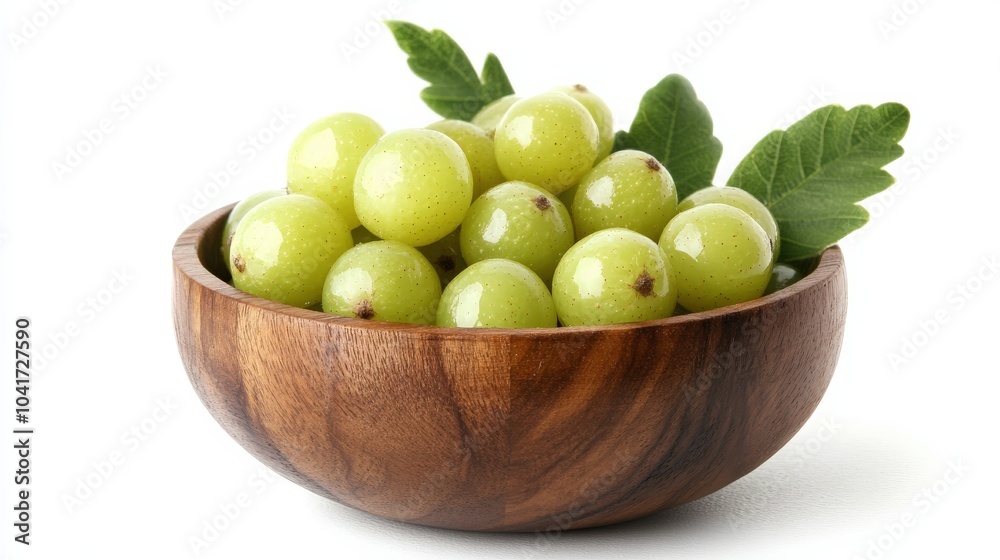 Phyllanthus: Closeup of Gooseberry Fruits in Wooden Bowl with Green Leaf and Slice on White Background Phyllanthus: Closeup of Gooseberry Fruits in Wooden Bowl with Green Leaf and Slice on White Background