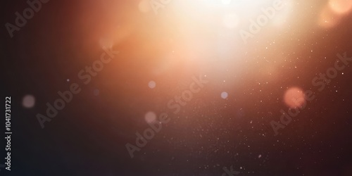 Abstract light particles on a dark background creating a dreamy atmosphere.