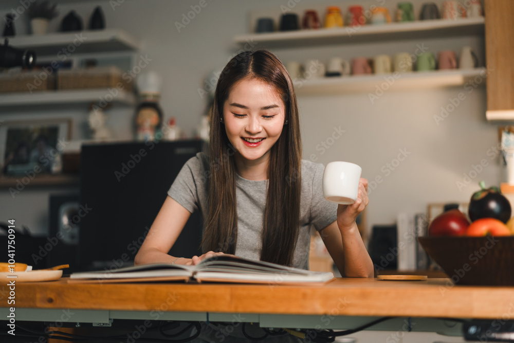 young woman enjoys reading book while holding cup, surrounded by cozy indoor setting. Her smile reflects moment of relaxation and contentment young woman enjoys reading book while holding cup, surrounded by cozy indoor setting. Her smile reflects moment of relaxation and contentment