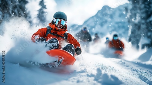 Group sledding down snowy mountain with speed