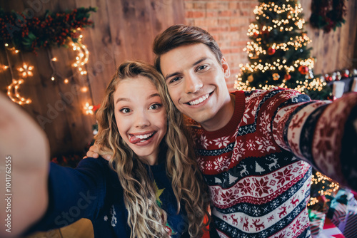 Photo of pretty young couple take selfie photo cheerful dressed christmas garment tradition atmosphere decor house indoors room