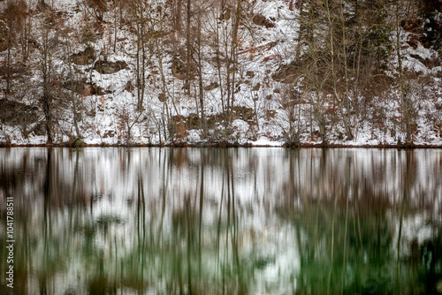 Mystical and peaceful Lake Cresta with snow in winter. photo