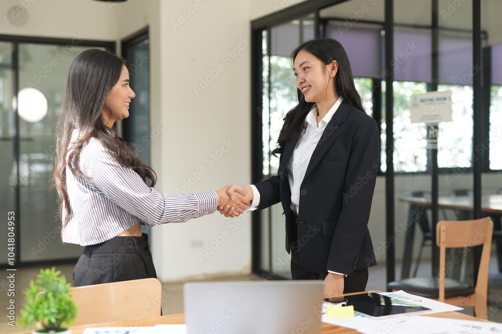 Asian woman succeeds at office Asian woman succeeds at office