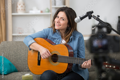 happy woman ready for recording a music blog