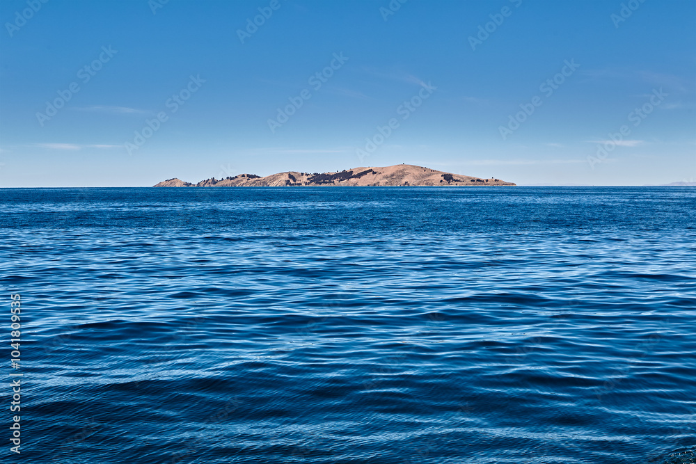 Fototapeta premium Discovering the hidden gem of Lake Titicaca Suasi Island. A serene escape where nature meets Tranquility, offering breathtaking views and a glimpse into the rich culture of Peru. Every moment here fee