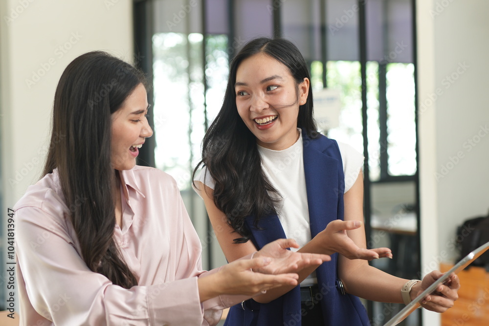 Fototapeta premium Asian woman succeeds at office