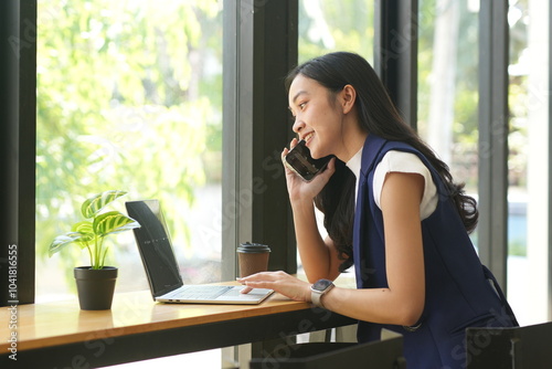 Asian woman succeeds at office