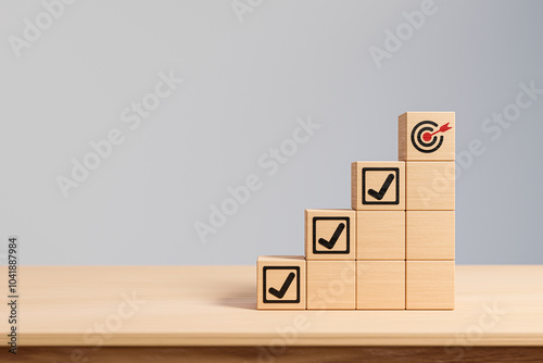 Fototapeta Naklejka Na Ścianę i Meble -  Check mark and dartboard from top of wooden cube stacks, Complete Task list. Goals achievement or enterprise objective target for company success. To do list. Keys for success in business. 3d render
