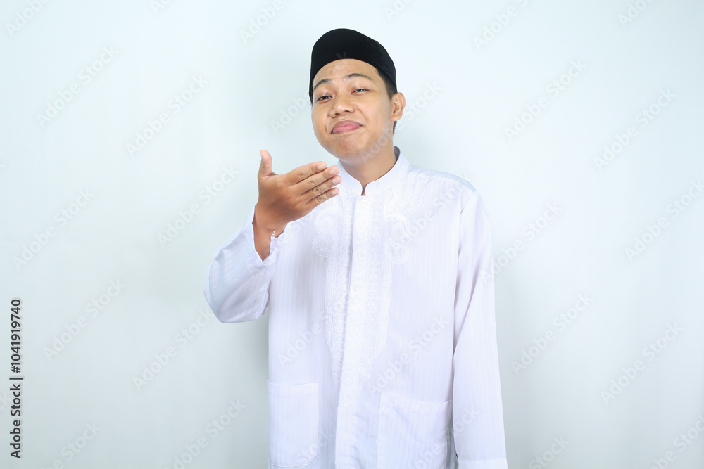 asian muslim man pleased inhale tasty food in eid mubarak celebration isolated on white background asian muslim man pleased inhale tasty food in eid mubarak celebration isolated on white background