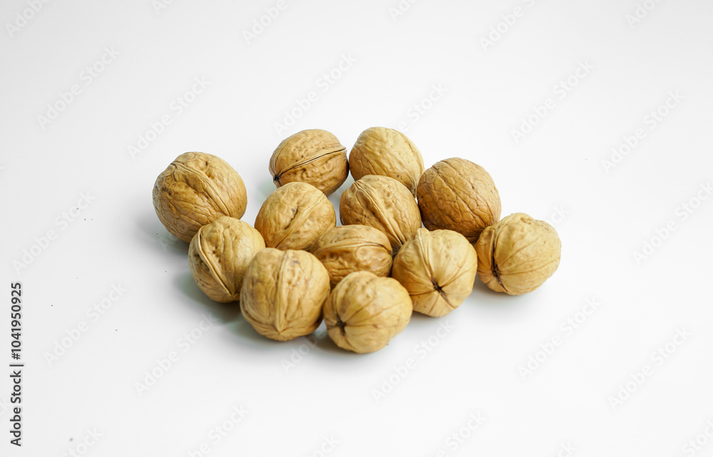 Ripe dry split walnut. Walnuts Isolated on White Background. closeup of shelled organic walnut halves. walnut, nut, full depth of field Ripe dry split walnut. Walnuts Isolated on White Background. closeup of shelled organic walnut halves. walnut, nut, full depth of field