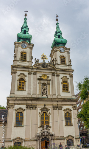 Baroque Twin Clock Towered Saint Anna Church in Buda Along Danube River in Budapest, Hungary.