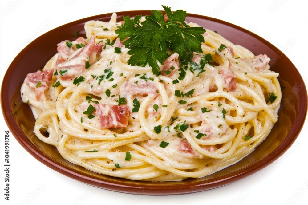 A plate of spaghetti carbonara with parsley garnish, isolated on white, the pasta twirled perfectly