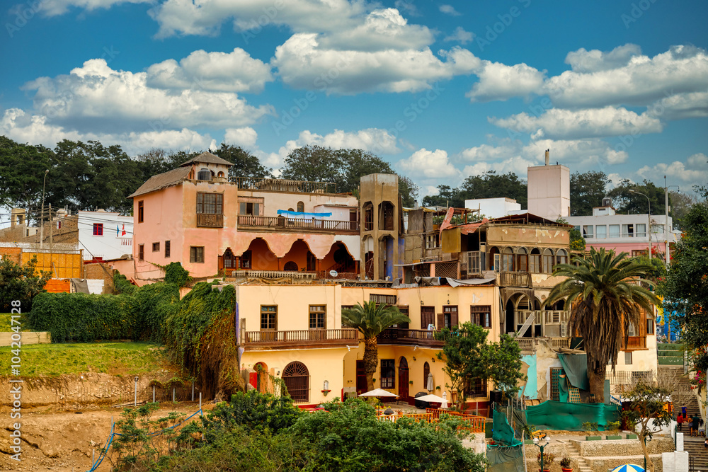 Obraz premium Several old houses in a ravine in the bohemian district of Barranco in Lima, Peru