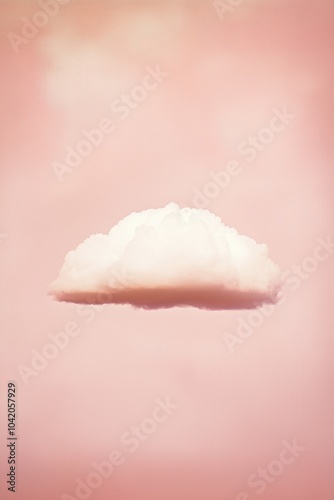 Single White Cloud on Pink Background	 photo