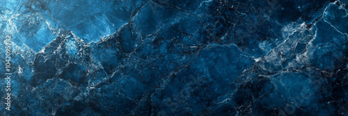 A striking blue marble with silver , futuristic design. photo