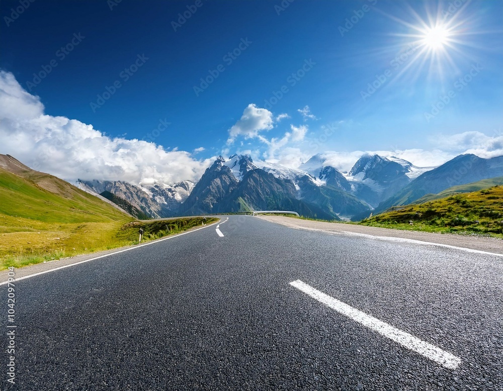 Naklejka premium mountain landscape and blue sky above asphalt road