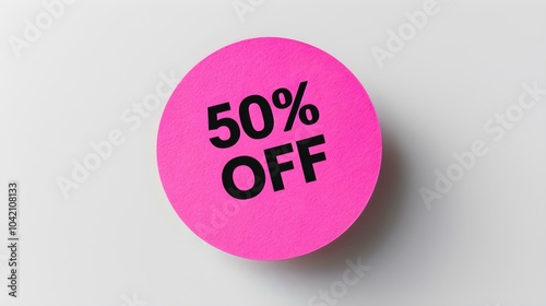 Black '50% OFF' Text on a Fuchsia Round Paper Note. White Background with Copy Space