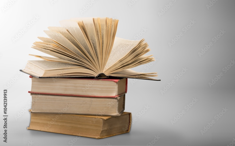 Fototapeta premium stack of old reading books on background