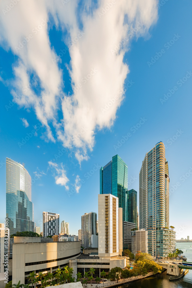Skyline of office and apartment buildings in downtown Miami, with Miami river and Biscayne Bay, Florida, United States Skyline of office and apartment buildings in downtown Miami, with Miami river and Biscayne Bay, Florida, United States