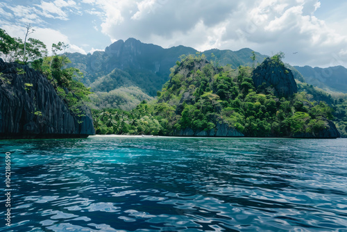 The tranquil waters reveal vibrant shades of blue, while towering green cliffs and dense foliage create a stunning backdrop in a tropical setting under a bright sky