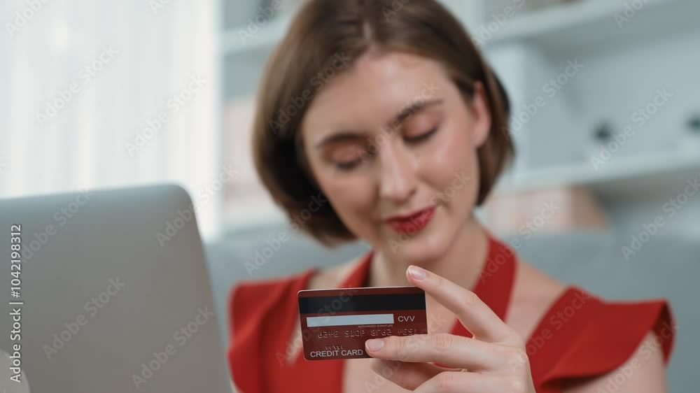 Woman shopping or pay online on internet marketplace browsing for sale items for modern lifestyle and use credit card for online payment from wallet protected by prim cyber security software Woman shopping or pay online on internet marketplace browsing for sale items for modern lifestyle and use credit card for online payment from wallet protected by prim cyber security software