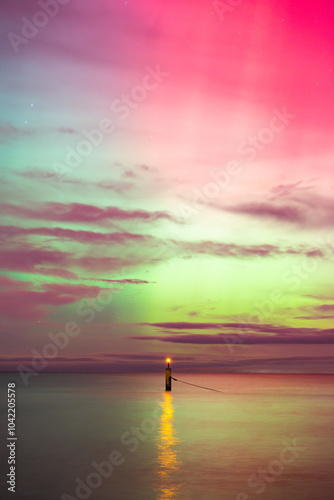 aurora borealis, northern lights above baltic sea in poland, stegna, october 2024 photo