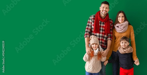 Happy family in winter clot...