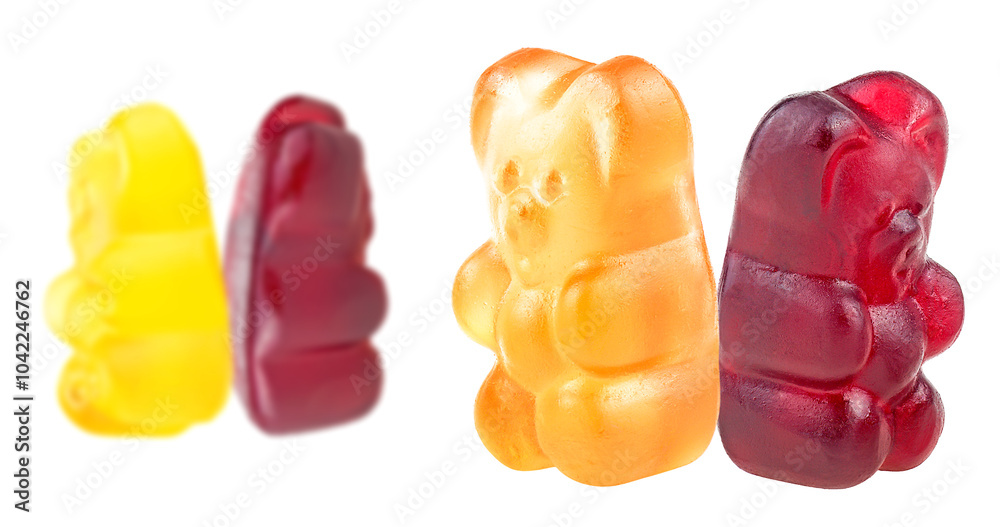 Sweet jelly marmalade bears isolated on a white background. Group of colorful fruit gummy candies. Sweet jelly marmalade bears isolated on a white background. Group of colorful fruit gummy candies.