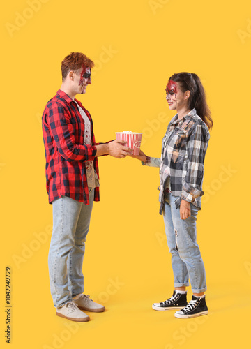 Young couple dressed for Ha...