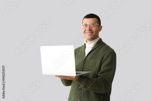 Young man in knitted sweate...