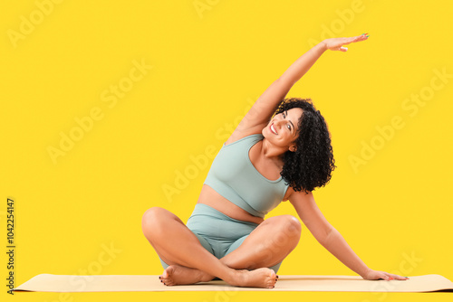 Sporty adult woman practici...