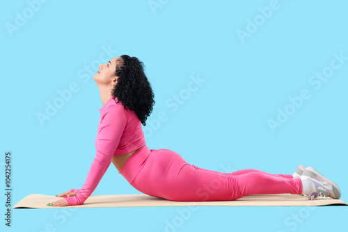 Sporty adult woman practici...