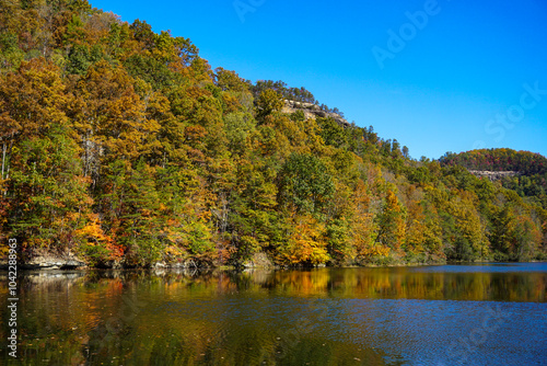 fall colors leaves, mountain over lake