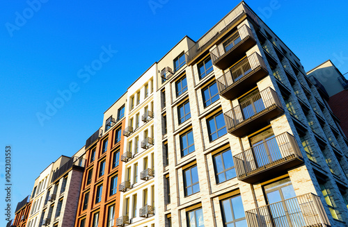 Wallpaper Mural Modern facade building. Colorful high rise urban Modern house. Windows of Skyscraper. Architecture building exterior, window house block. High Rise house. Residential development in UK. City built. Torontodigital.ca