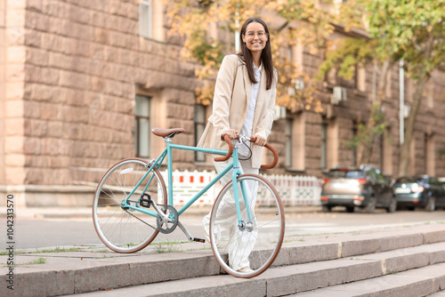 Young businesswoman with bi...